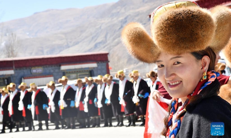 People dressed in traditional costumes celebrate the Tibetan New Year in Shannan, southwest China's Tibet Autonomous Region, March 3, 2022. The Tibetan New Year, a traditional festival of the Tibetan ethnic minority, falls on Thursday this year.(Photo: Xinhua)