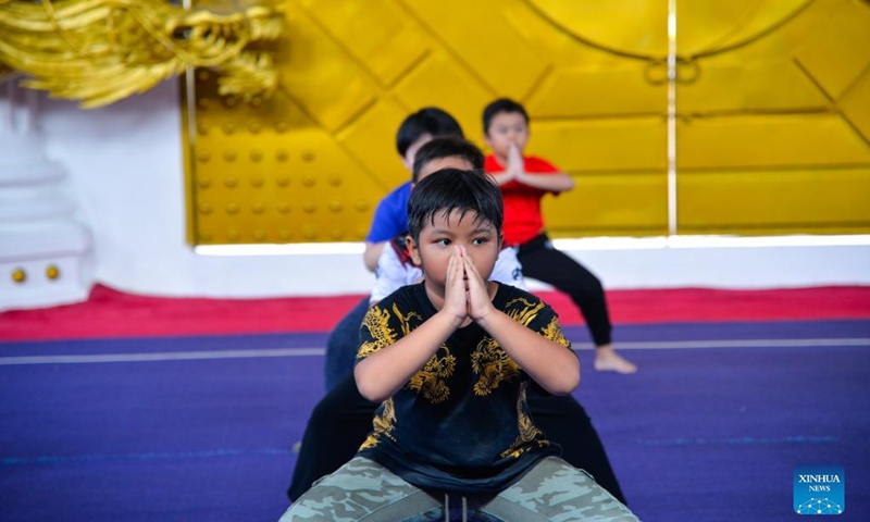 Children practice Chinese martial arts at Harmony Wushu Indonesia in Bogor, Indonesia, March 5, 2022.Photo:Xinhua
