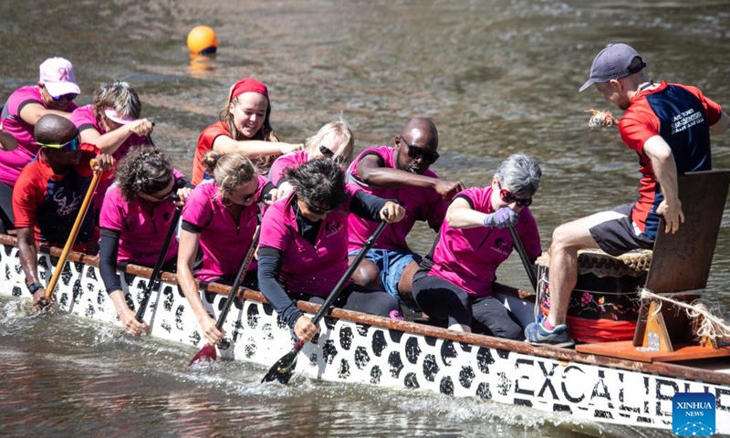 Paddlers compete in a canoe polo match during Century City Sports Festival in Cape Town, legislative capital of South Africa, on March 5, 2022.Photo:Xinhua