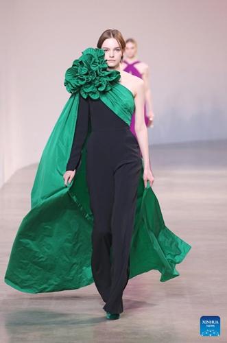 A model presents a creation of Hermes' Fall/Winter 2022 ready-to-wear collections during Paris Fashion Week in Paris, France, on March 5, 2022.Photo:Xinhua