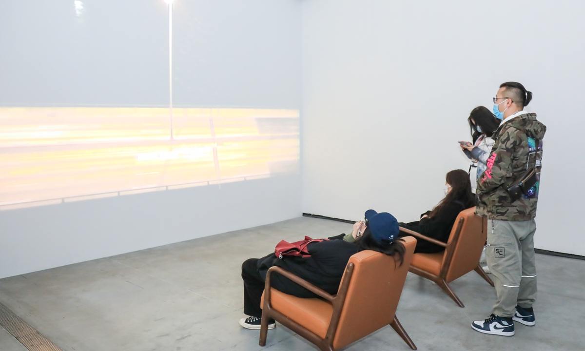 The visitors view the exhibition Photo: Courtesy of Beijing Minsheng Art Museum 