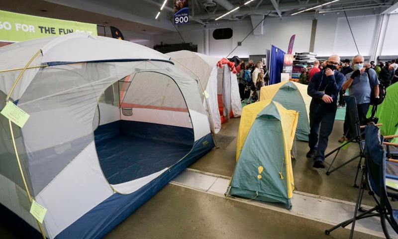 People look at camping tents at the Vancouver Outdoor Adventure and Travel Show in Vancouver, British Columbia, Canada, on March 5, 2022.Photo:Xinhua