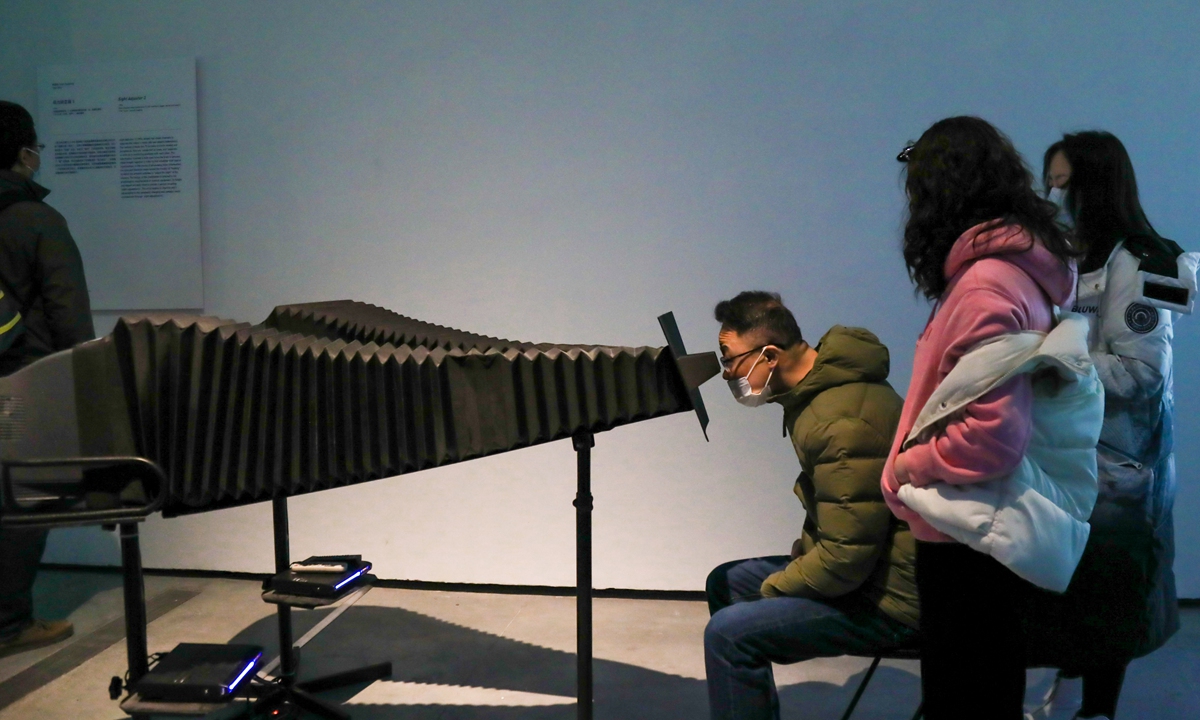 The visitors view the exhibition Photo: Courtesy of Beijing Minsheng Art Museum 