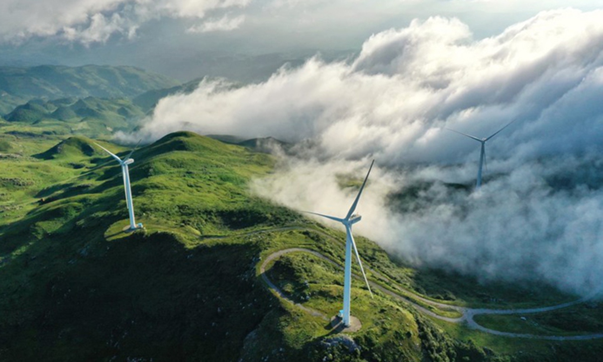 Aerial photo taken on August 19, 2020 shows wind turbines in Jiucaiping scenic spot in Southwest China's Guizhou Province. Photo: Xinhua