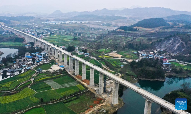 Aerial photo taken on March 5, 2022 shows the two-lane Yingpan Qingshui River Grand Bridge of the Guiyang-Nanning high-speed railway in southwest China's Guizhou Province.(Xinhua/Yang Wenbin)