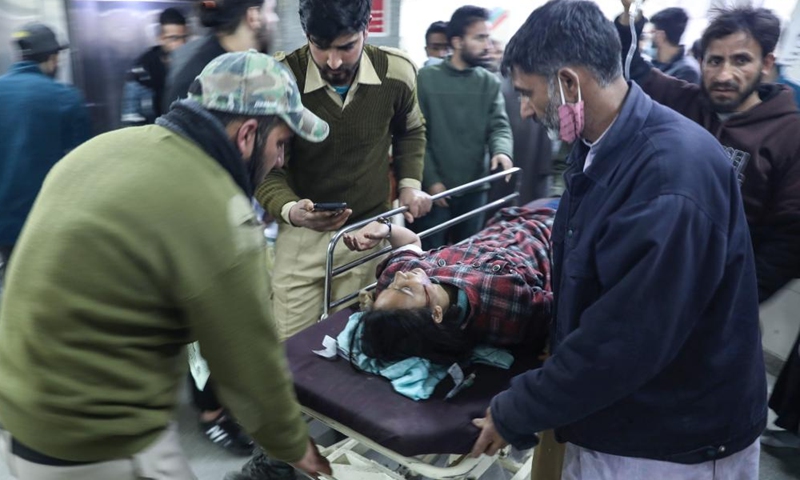 A wounded woman is carried on a stretcher at a hospital in Srinagar city, the summer capital of Indian-controlled Kashmir, on March 6, 2022. A civilian was killed and 23 others, including a policeman, were wounded Sunday in a grenade attack in restive Indian-controlled Kashmir, police said.Photo:Xinhua