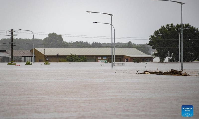 Flooded roads are seen in Windsor, New South Wales, Australia on March 8, 2022. Flash floods, wild winds and storms are continuing to lash Australia's east coast, causing hundreds of people to flee their ruined homes and killing at least 13 people in the state of Queensland and seven in New South Wales. (Photo: Xinhua)
