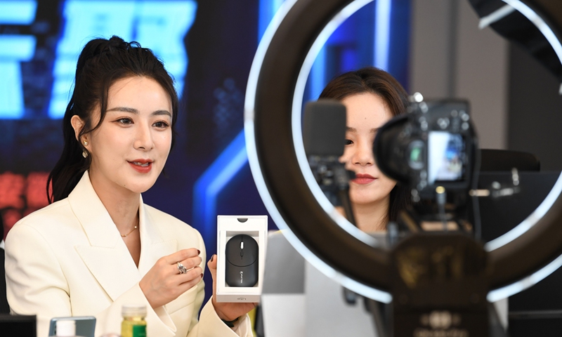 Chinese e-commerce livestreamer Huang Wei, or Viya, recommends products during a livestream show in April, 2021. Photo: VCG