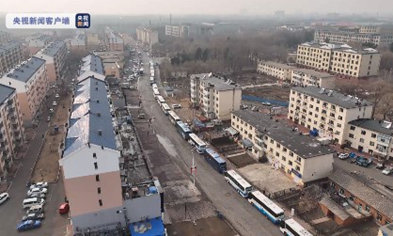 30 buses are seen at Jilin Agricultural Science and Technology University in Northeast China's Jilin Province to transfer students following a cluster infection detected in the campus on March 10, 2022. Photo: Screenshot of CCTV News