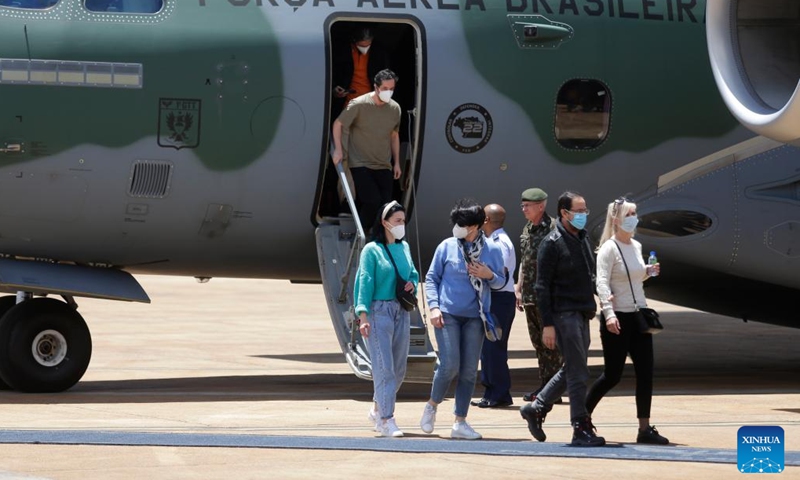 People evacuated from Ukraine land at Brasilia Air Base, Brazil, on March 10, 2022.(Photo: Xinhua)