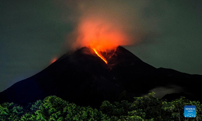 The long exposure photo taken on March 10, 2022 shows volcanic materials spewing from Mount Merapi seen from Kalitengah Lor village in Sleman district, Yogyakarta, Indonesia.Photo:Xinhua
