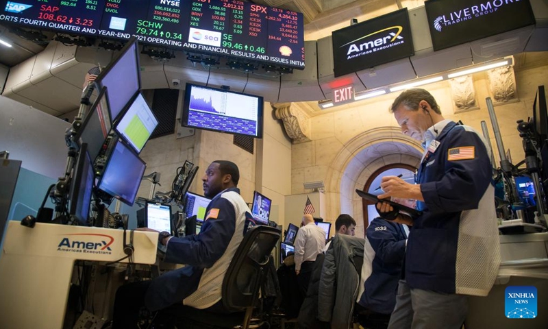 Traders work on the floor of the New York Stock Exchange (NYSE) in New York, the United States, on March 10, 2022.Photo:Xinhua
