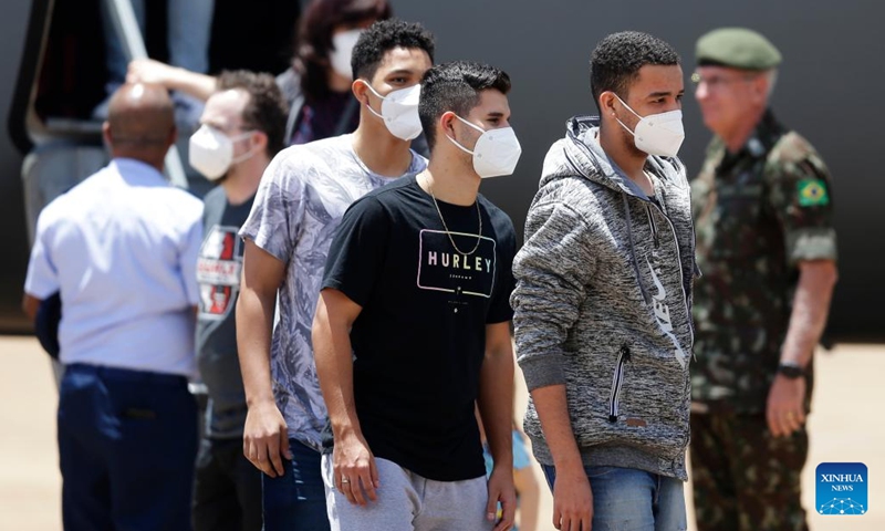 People evacuated from Ukraine land at Brasilia Air Base, Brazil, on March 10, 2022.(Photo: Xinhua)