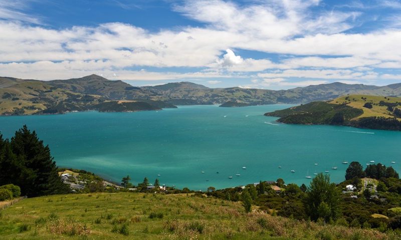 Photo taken on Jan. 11, 2022 shows a view of Banks Peninsula, where the town of Akaroa is located, in New Zealand.(Photo: Xinhua)