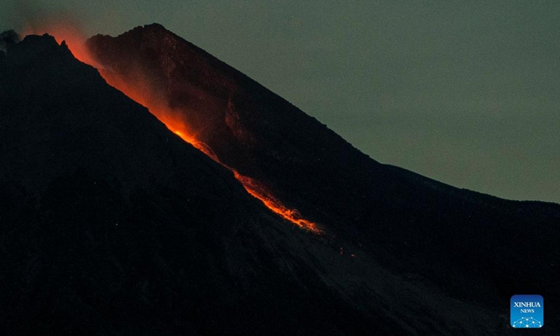The long exposure photo taken on March 10, 2022 shows volcanic materials spewing from Mount Merapi seen from Kalitengah Lor village in Sleman district, Yogyakarta, Indonesia.Photo:Xinhua