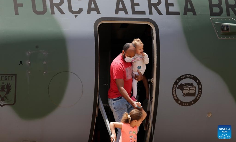 People evacuated from Ukraine land at Brasilia Air Base, Brazil, on March 10, 2022.(Photo: Xinhua)