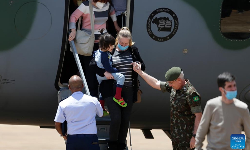 People evacuated from Ukraine land at Brasilia Air Base, Brazil, on March 10, 2022.(Photo: Xinhua)