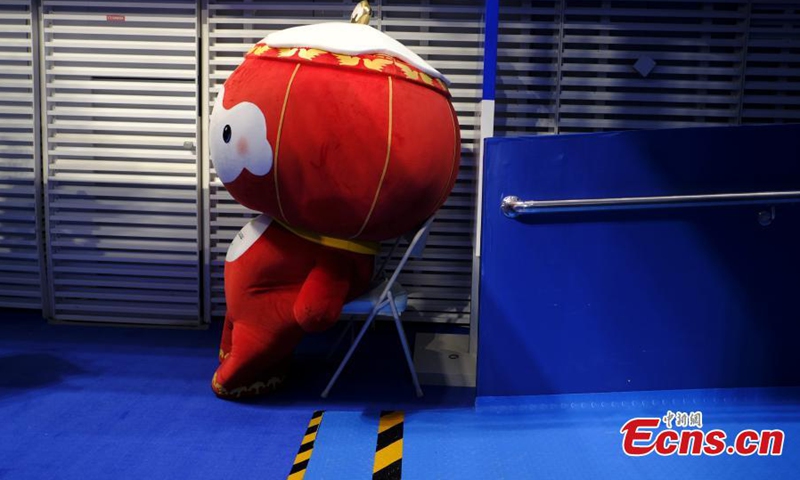 Shuey Rhon Rhon, the red lantern-shaped mascot of Beijing 2022 Winter Paralympic Games, appears at the National Aquatics Center, also known as the Ice Cube, venue of wheelchair curling competition of the Games in Beijing, March 10, 2022.Photo:China News Service