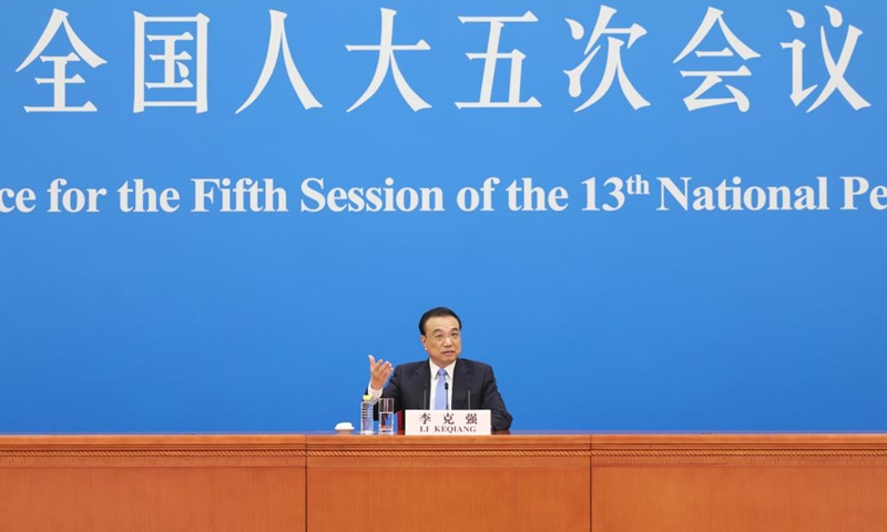 Chinese Premier Li Keqiang meets the press via video link after the closing of the fifth session of the 13th National People's Congress (NPC) at the Great Hall of the People in Beijing, capital of China, March 11, 2022.(Photo: Xinhua)
