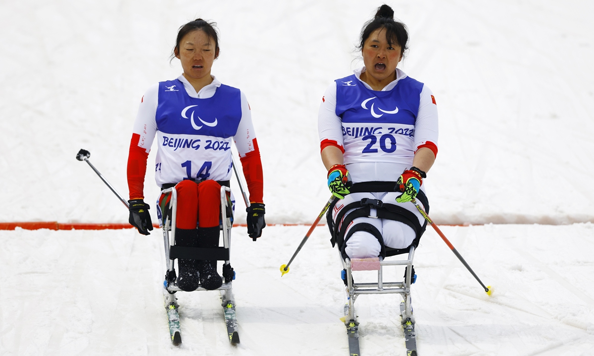 China's Li Panpan and Wang Shiyu compete in Women's Sprint Sitting Final of the Beijing 2022 Winter Paralympic Games in Beijing on March 9, 2022. Photo: IC