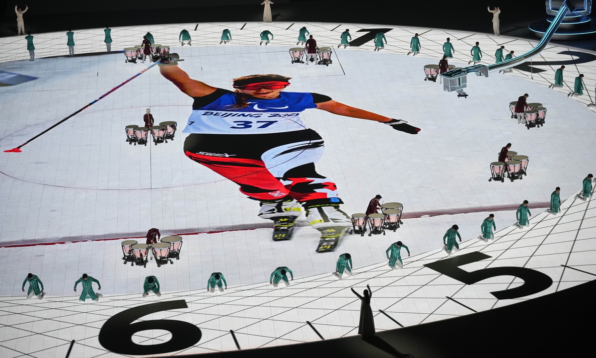 Participants perform during the closing ceremony of the 2022 Winter Paralympics on March 13, 2022 in Beijing. Photo: VCG