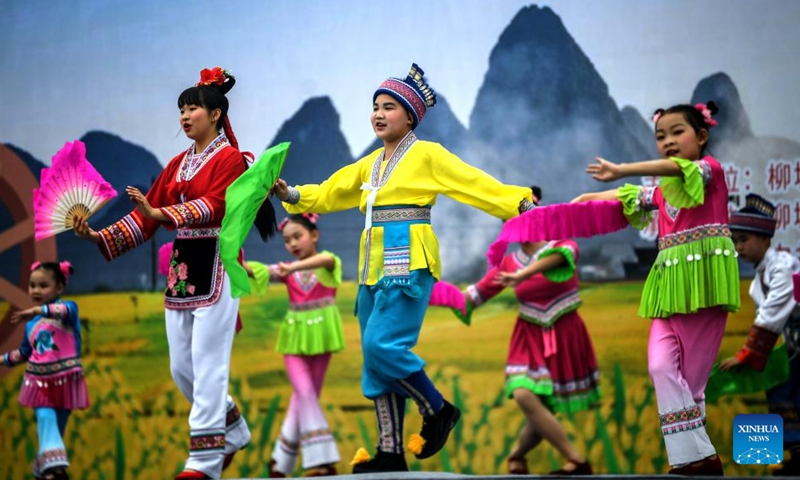Pupils rehearse opera in Liucheng County, south China's Guangxi Zhuang Autonomous Region, March 11, 2022. (Xinhua/Zhang Ailin)