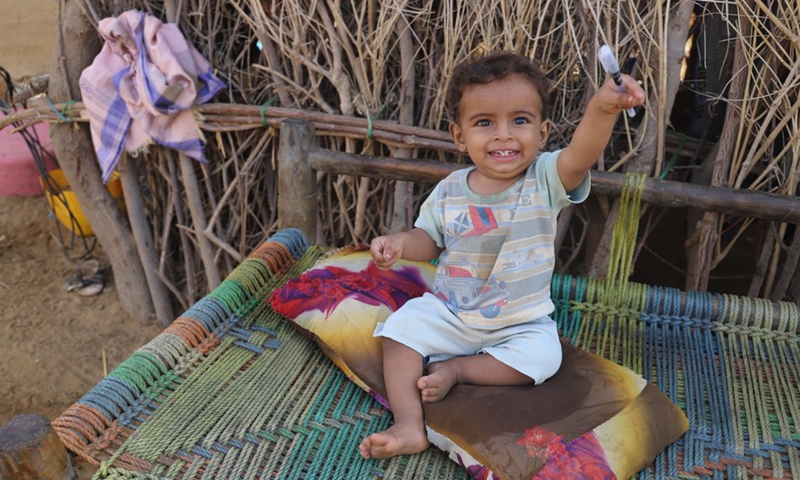 A child is seen in a village for internally displaced persons (IDPs) in Hajjah province, northern Yemen on Feb. 1, 2022.Photo:Xinhua