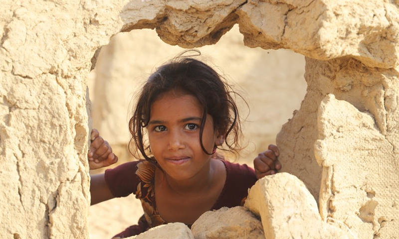 A girl poses in a village for internally displaced persons (IDPs) in Hajjah province, northern Yemen on Feb. 1, 2022.Photo:Xinhua