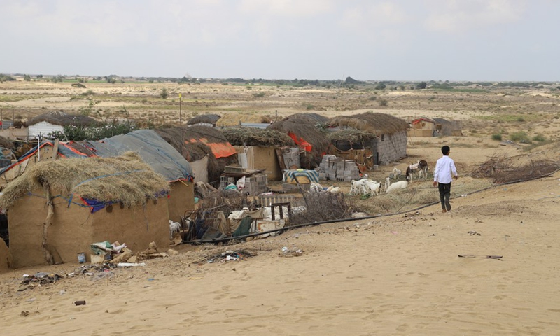 A child walks in a village for internally displaced persons (IDPs) in Hajjah province, northern Yemen on Feb. 1, 2022.Photo:Xinhua