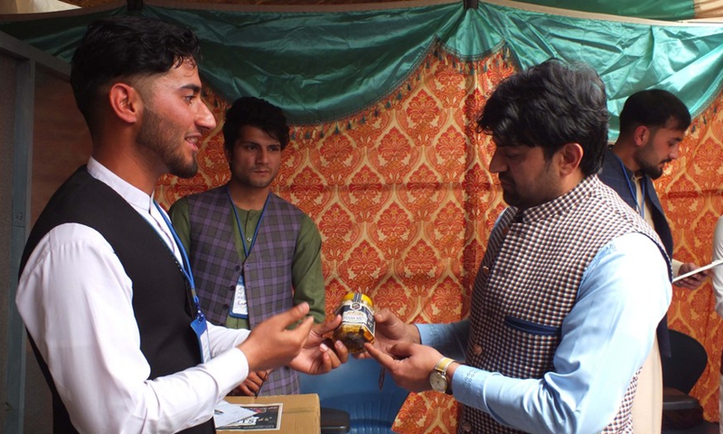 Afghan students display their products in Jalalabad of Nangarhar province, Afghanistan, March 12, 2022.Photo:Xinhua