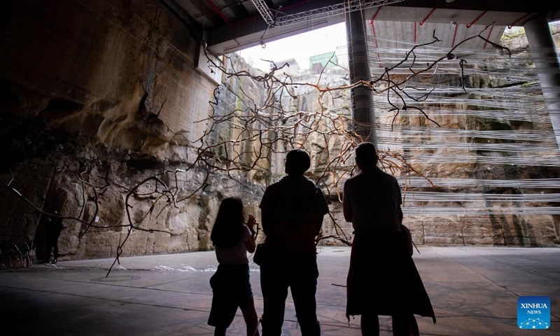 People visit Biennale of Sydney rivus at Art Gallery of New South Wales (NSW) in Sydney, Australia, on March 13, 2022. The 23rd Biennale of Sydney is held from March 12 to June 13, with more than 330 artworks by over 80 participants presented during the event. (Photo by Hu Jingchen/Xinhua)