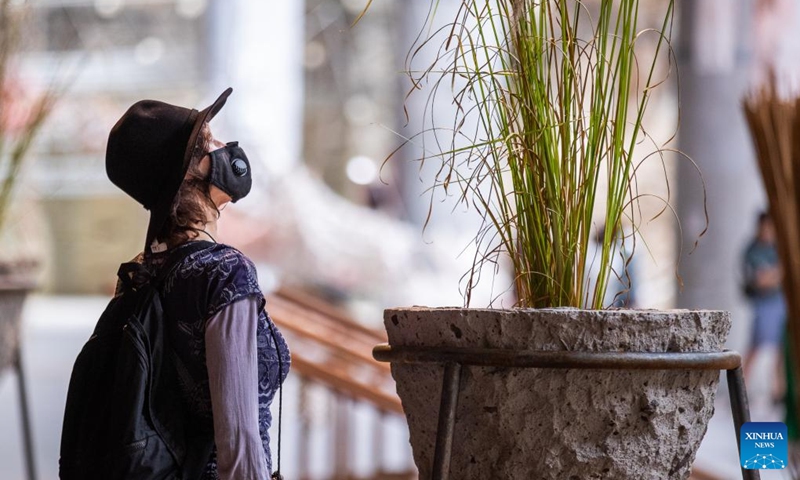 A woman visits Biennale of Sydney rivus at Art Gallery of New South Wales (NSW) in Sydney, Australia, on March 13, 2022. The 23rd Biennale of Sydney is held from March 12 to June 13, with more than 330 artworks by over 80 participants presented during the event. (Photo by Hu Jingchen/Xinhua)