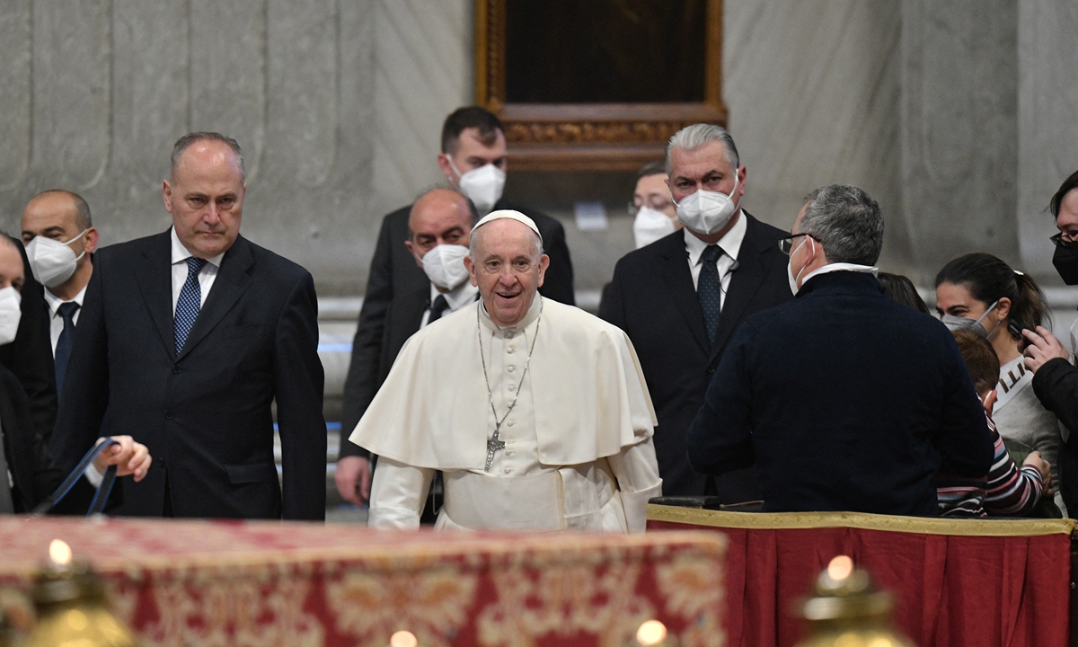 Pope Francis arrives to hold an audience on March 16, 2022 for the 50th anniversary of Milan's school 