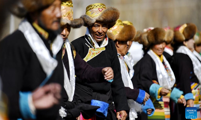Villagers participate in a ceremony marking the start of spring farming in Changzhug Township of Shannan, southwest China's Tibet Autonomous Region, March 16, 2022. The annual spring farming ceremony was held in Tibet on Wednesday to pray for a bumper harvest of the year.(Photo: Xinhua)