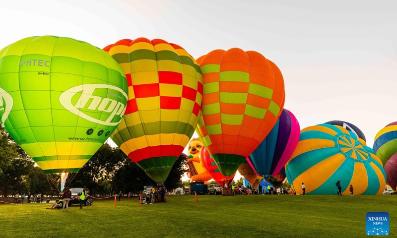 Hot air balloons are seen during the annual Canberra Balloon Spectacular festival in Canberra, Australia, March 18, 2022. The annual Canberra Balloon Spectacular festival, a hot air balloon festival celebrated in Australia's capital city, is held this year from March 12 to 20.Photo:Xinhua