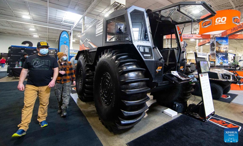 People look at a new Argo Sherp Pro XT during the 2022 Toronto Sportsmen's Show in Mississauga, the Greater Toronto Area, Canada, on March 17, 2022. As the biggest event for outdoor enthusiasts in Ontario, the 2022 Toronto Sportsmen's Show is held here from March 17 to 20.(Photo: Xinhua)