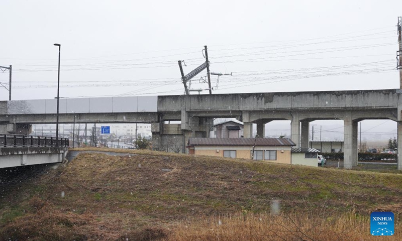Photo taken on March 18, 2022 shows an inclined utility pole after an earthquake in Shiroishi City of Miyagi Prefecture, Japan. Photo:Xinhua