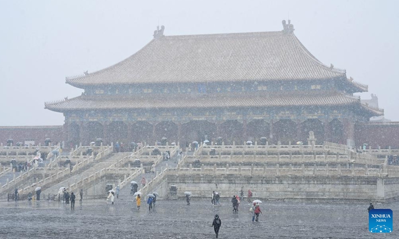 People visit the Palace Museum amid snow in Beijing, capital of China, March 18, 2022.Photo:Xinhua