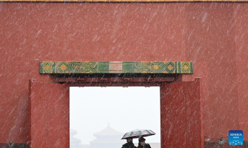 People visit the Palace Museum amid snow in Beijing, capital of China, March 18, 2022.Photo:Xinhua