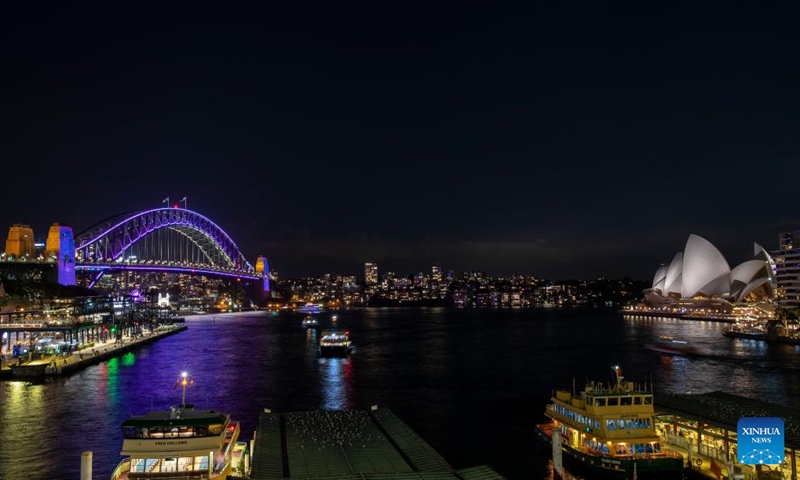 Photo taken on March 18, 2022 shows vivid light on Harbour Bridge in Sydney, Australia, as part of the Sydney Harbour Bridge 90th anniversary celebration.Photo:Xinhua