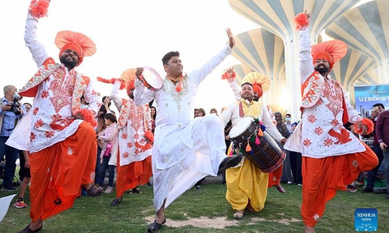 Artists perform during a cultural exhibition in Capital Governorate, Kuwait, on March 19, 2022.Photo:Xinhua