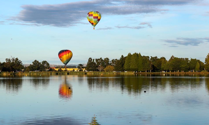 Hot-air balloons are seen during the 5-day Balloons Over Waikato Festival in Hamilton, New Zealand, March 18, 2022.Photo:Xinhua