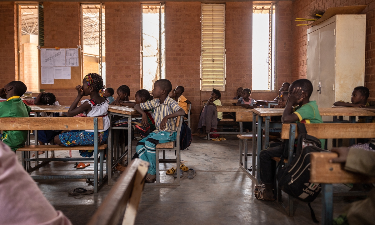 Schoolchildren attend a lesson at the Opera Village school, designed by architect Francis Kere, in Laongo, on March 16, 2022. Photos: AFP