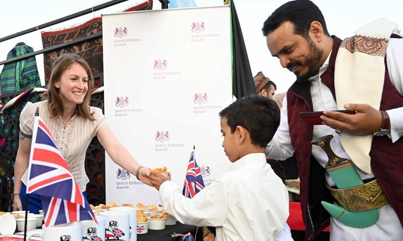 People visit a cultural exhibition in Capital Governorate, Kuwait, on March 19, 2022.Photo:Xinhua