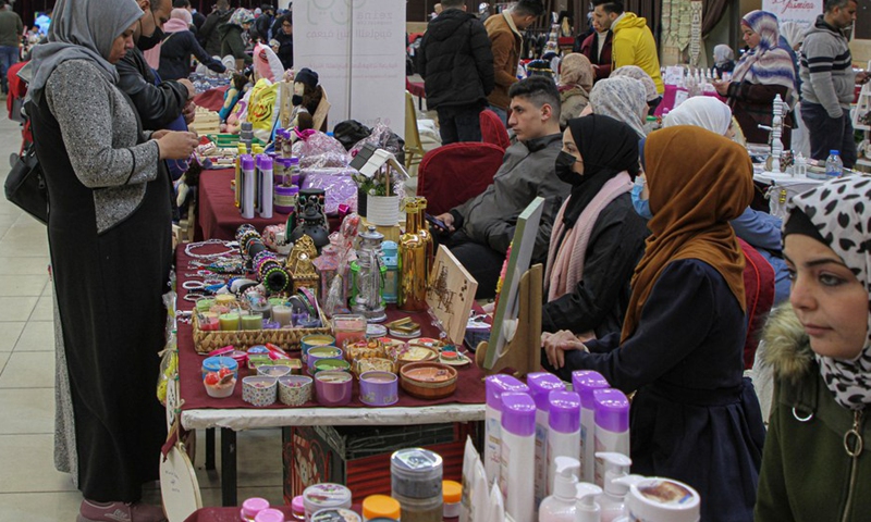 Palestinians visit a special bazaar called Creative Land at a hotel in Gaza City, on March 21, 2022.(Photo: Xinhua)