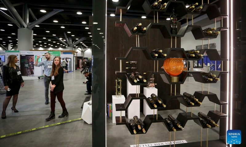 Wine cellar products are displayed during the 2022 BUILDEX show in Vancouver, British Columbia, Canada, on March 23, 2022. As one of Canada's largest conferences and trade shows for building industry, the 2022 BUILDEX Vancouver kicked off on Wednesday, showcasing the latest building materials, products and technologies.(Photo: Xinhua)