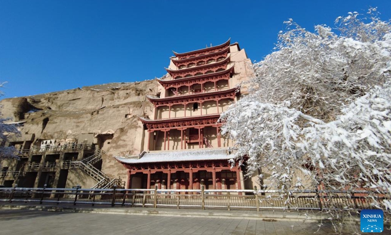 Photo taken on March 25, 2022 shows a view of the Mogao Grottoes, a world cultural heritage site, in Dunhuang, northwest China's Gansu Province.Photo:Xinhua