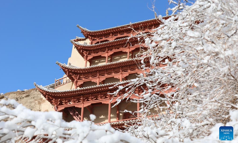 Photo taken on March 25, 2022 shows a view of the Mogao Grottoes, a world cultural heritage site, in Dunhuang, northwest China's Gansu Province.Photo:Xinhua