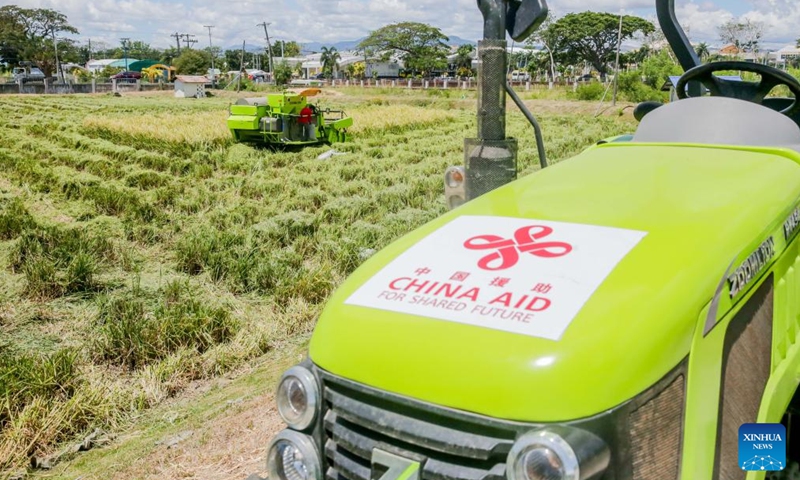 A farmer works at the Philippine-Sino Center for Agricultural Technology (PhilSCAT) in Nueva Ecija province, the Philippines on March 25, 2022. The Philippines is reaping fruits of its agricultural collaboration with China in increasing food supply and safeguarding food security in the country, Agriculture Secretary William Dar said on Friday.Photo:Xinhua