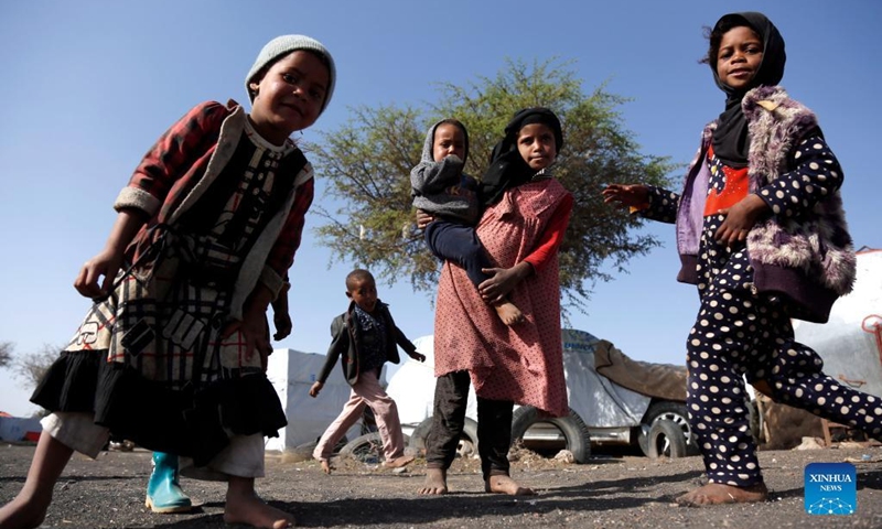 Children play at the Dharawan camp for internally displaced persons (IDPs) near Sanaa, Yemen, on March 25, 2022. Yemen has been mired in a civil war since late 2014 when the Iran-backed Houthi militia seized control of several northern provinces and forced the Saudi-backed Yemeni government of President Abd-Rabbu Mansour Hadi out of the capital Sanaa.(Photo: Xinhua)